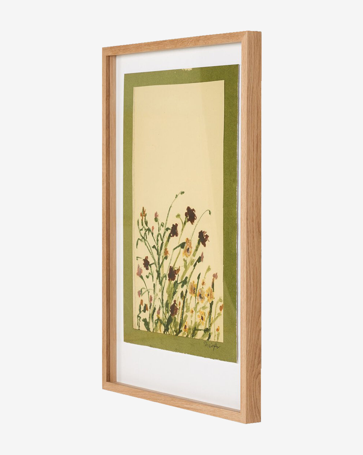 Wildflower Medley by Shaina Page features a botanical illustration of wildflowers on fine art paper, set on a cream background with a green border and displayed in a light oak frame shown from an angled side view, by Vendixs