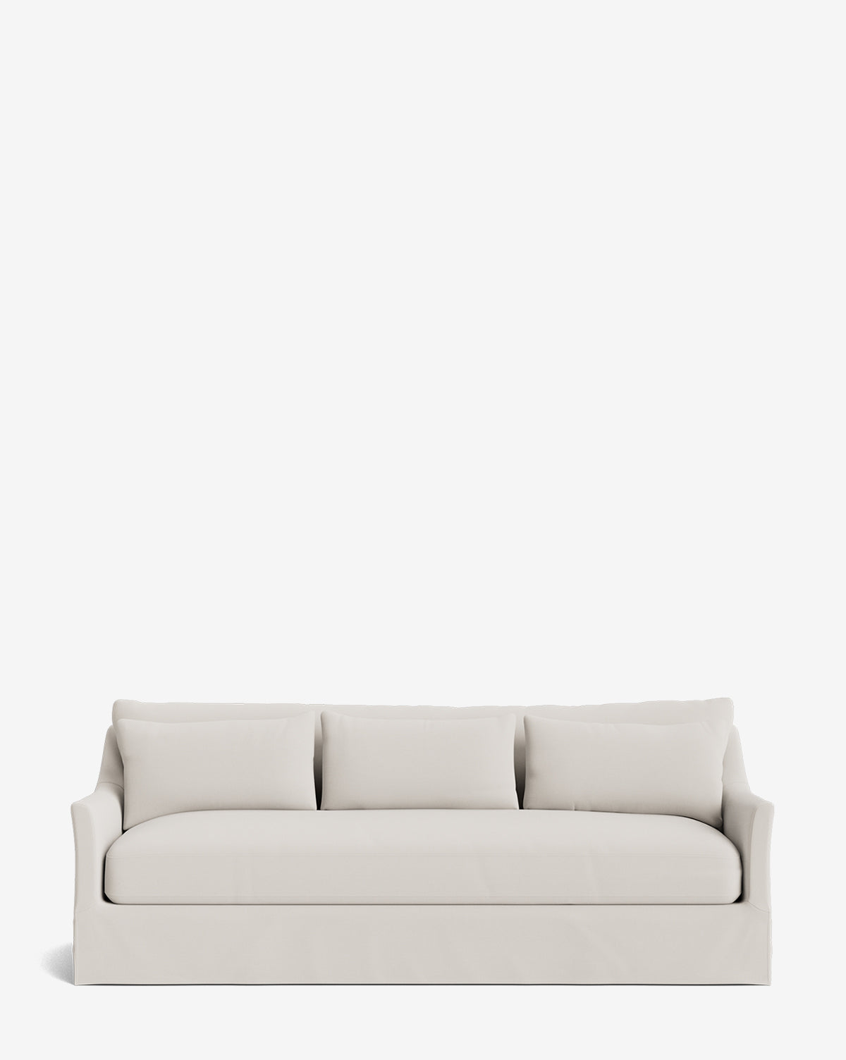 The Wilhelmina Classic Slipcover Sofa (85-110) features a modern, light beige design with three back cushions and clean lines, providing a luxurious seat as shown against a plain white background, by McGee & Co.