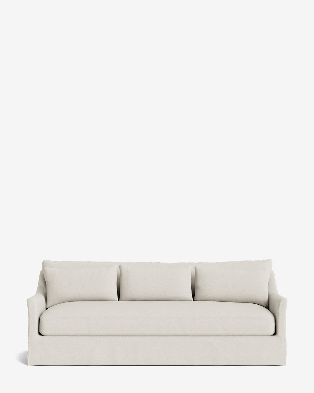 The Wilhelmina Deep Slipcover Sofa (85-110) features a modern, light beige design with three back cushions and low, curved arms, by Vendixs Its minimalist style offers luxurious comfort and is shown against a plain white background.