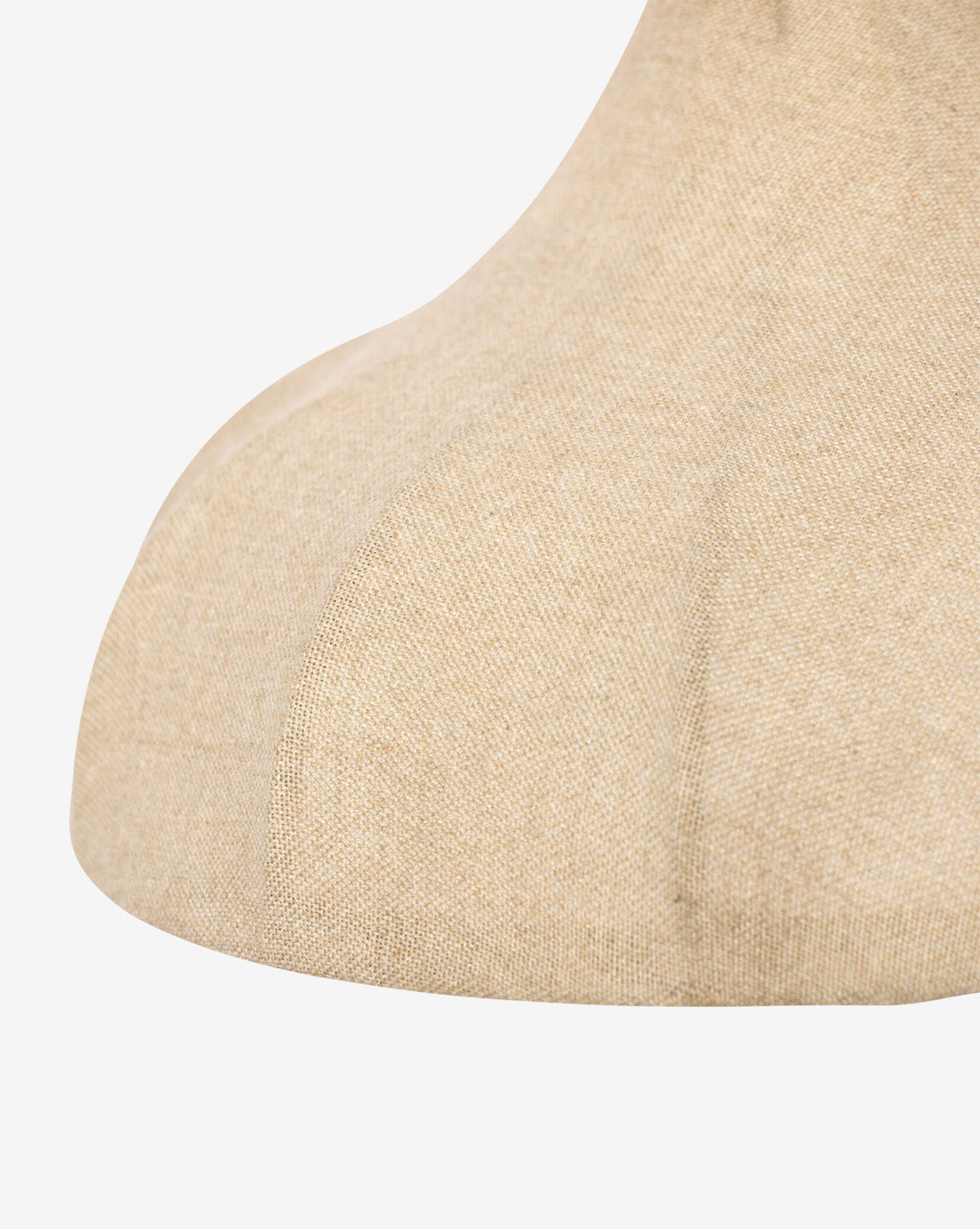 Close-up of a beige fabric mannequin neck and upper chest, highlighting textured cloth and fine stitching, echoing the refined look of the Winslet Sconce's linen shade, by Vendixs