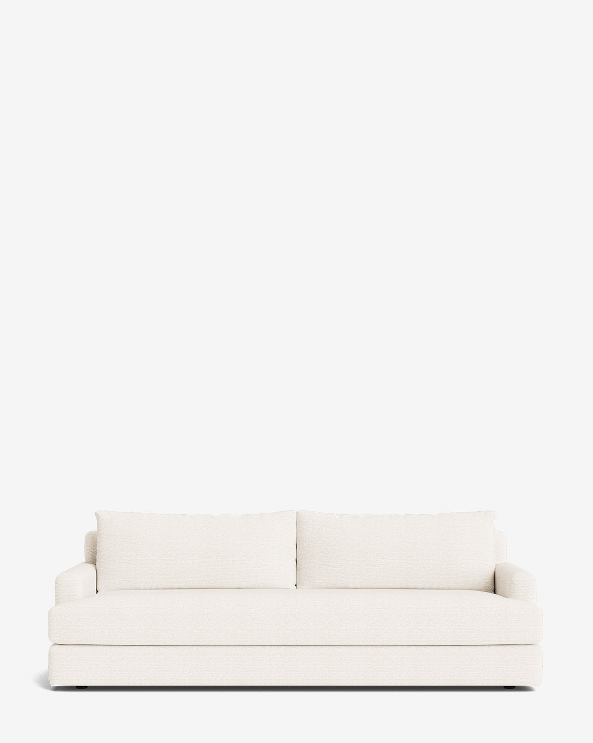 The Winthrop Sofa 90 is a modern, minimalist made-to-order sofa in off-white, featuring two large back cushions and low arms, shown against a plain white background by Vendixs
