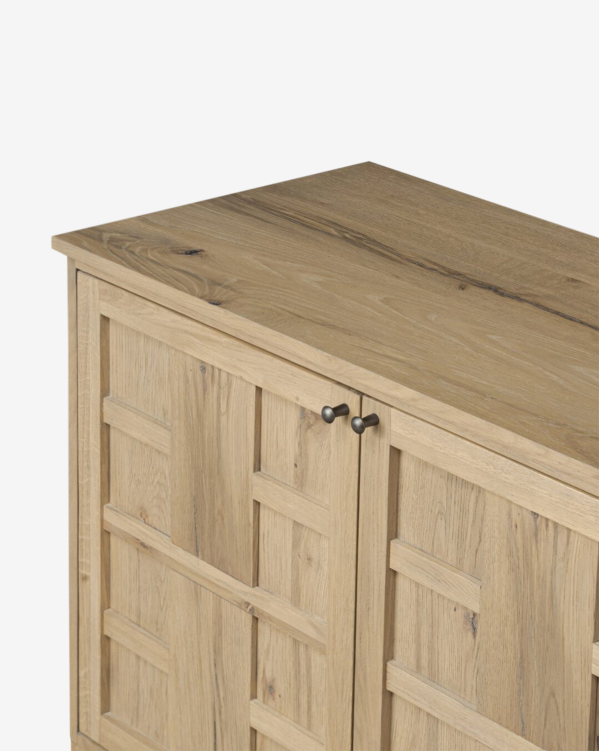 The Wynne Sideboard is a solid oak storage unit with a natural finish, showcasing geometric square-patterned doors and two small round metal handles, by Vendixs