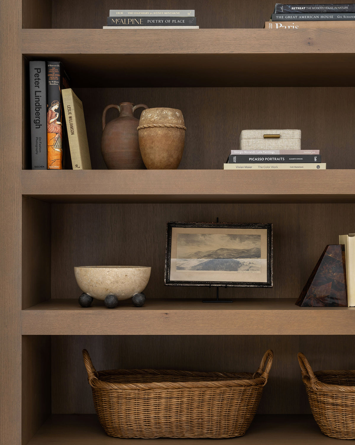 Small Landis Planter, 6” Dia. x 8” H, ceramic with aged glaze, displayed on a bookshelf, from Vendixs