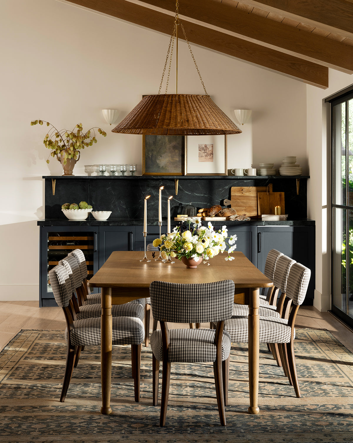 The Corinne Woven Hanging Shade above adds an organic lighting touch to the space, by Vendixs