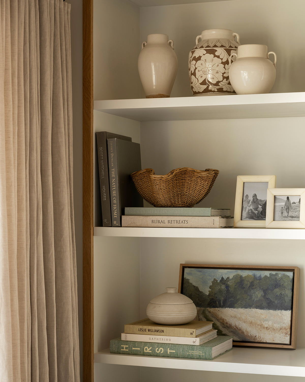 Beige curtains to the left complete the calm, neutral-toned decor, by Vendixs
