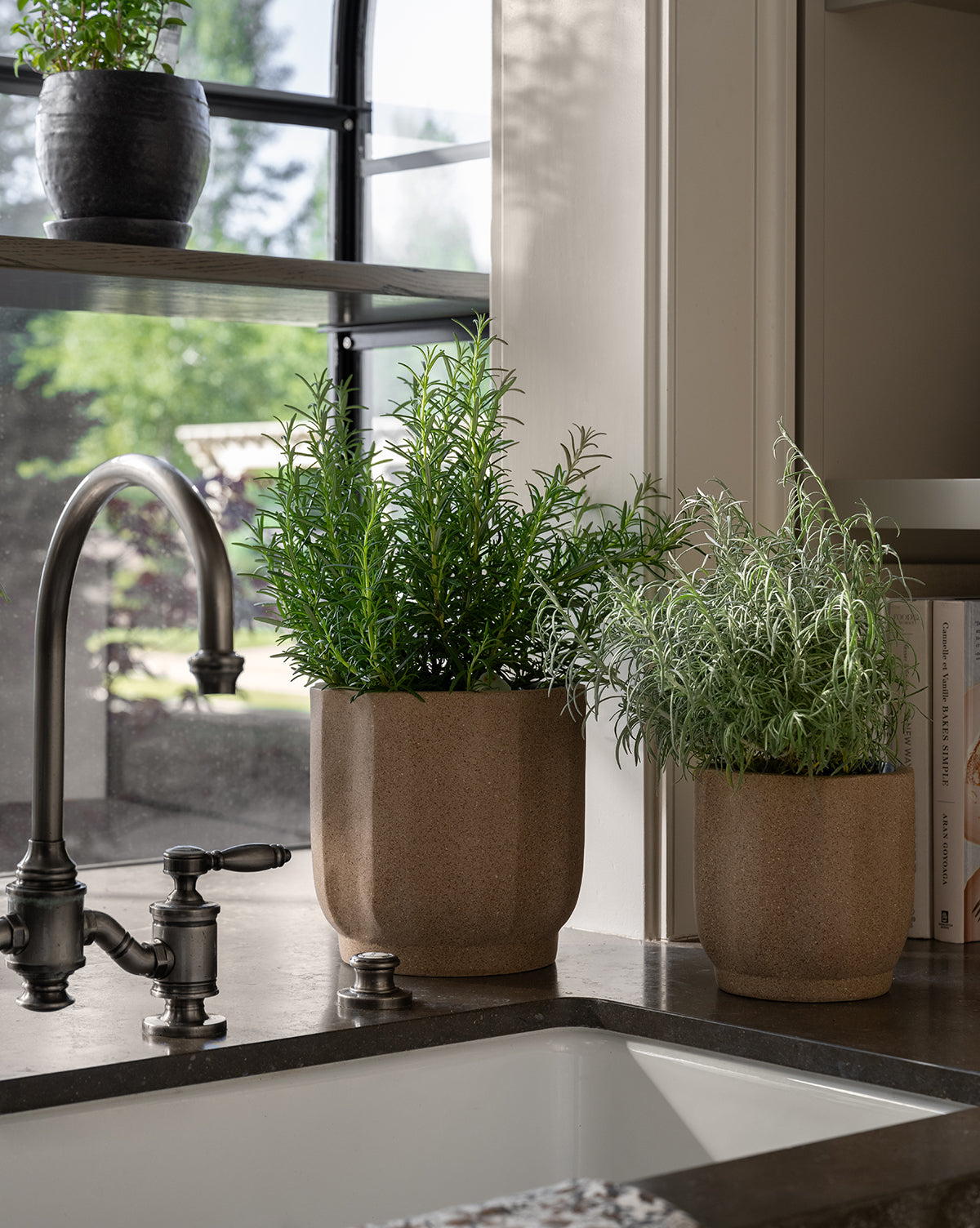 Trella Planter in distressed white terracotta, shown in small and medium sizes side by side, from Vendixs