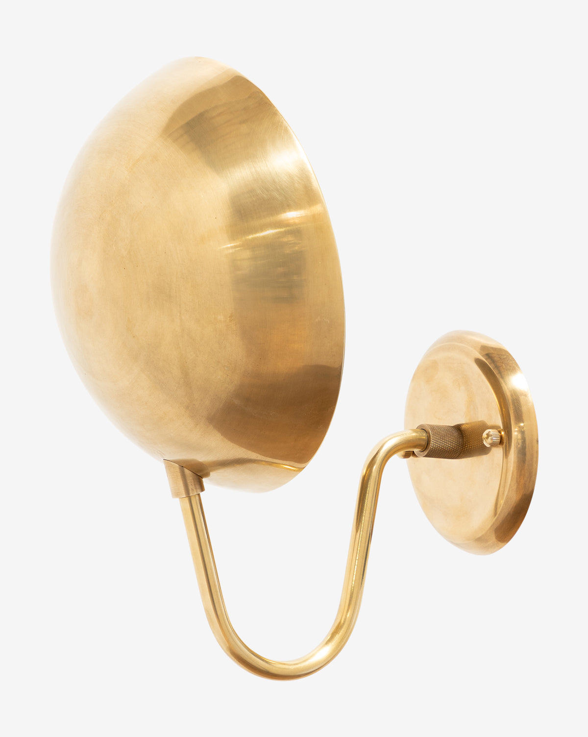 The Aldorno Sconce by Makerspalm features a modern wall-mounted design with a round shade, curved arm, and circular base in polished gold—ideal for bringing elegant lighting to your space. Vendixs