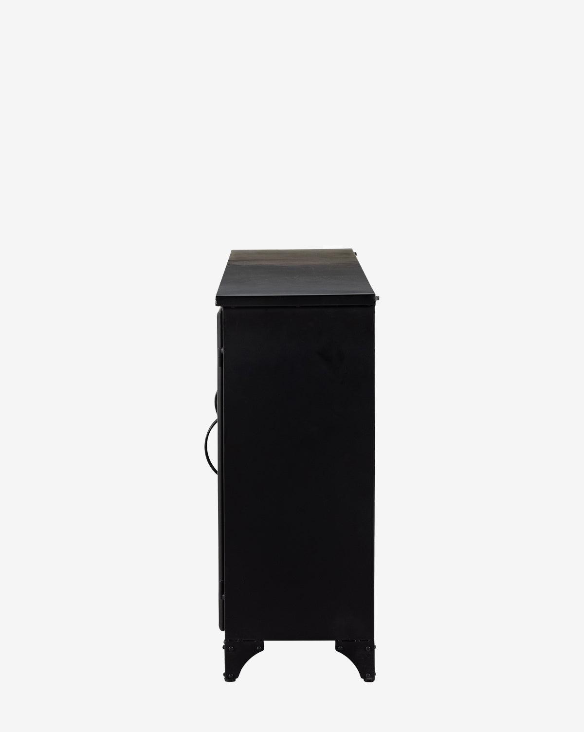 The Amalie Sideboard, shown in black with a rectangular shape and flat top, is pictured from the side against a plain white background, highlighting its simple and minimal design.