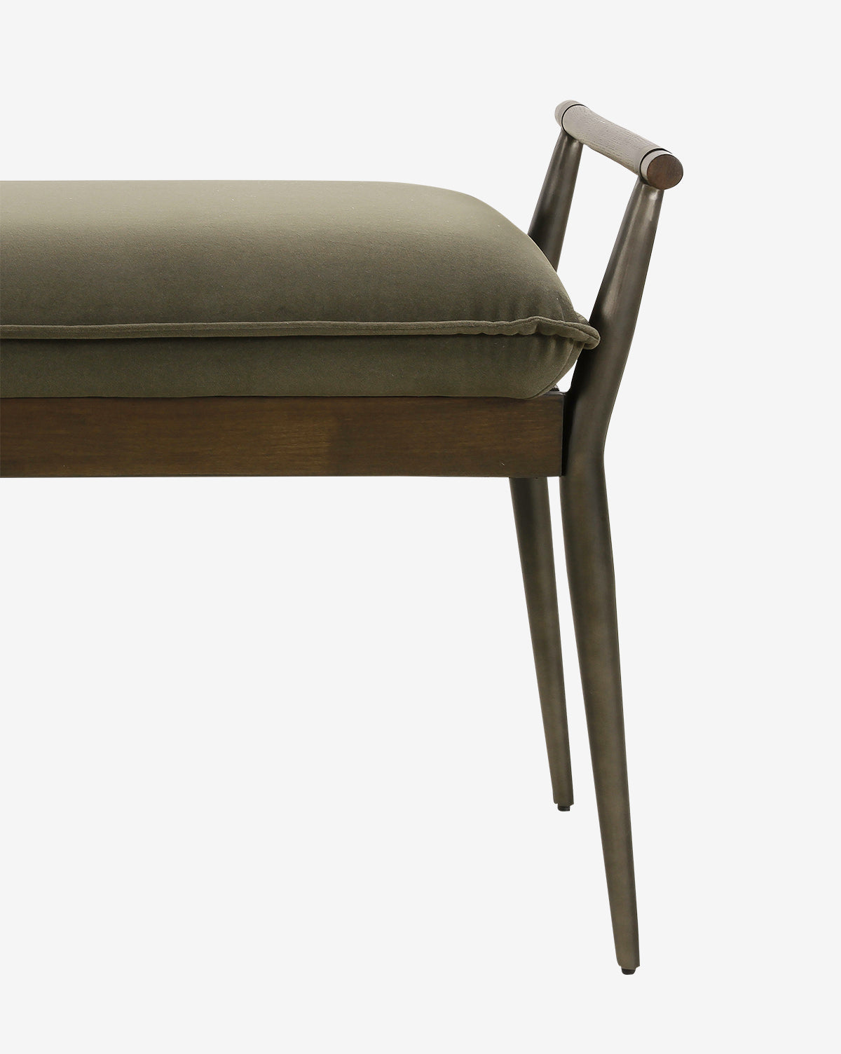 The Balfour Bench showcases slender steel legs, a wooden frame, and an olive-green upholstered cushion. Its minimal backrest has two angled metal supports topped with a wooden rail, all set against a white background by Vendixs
