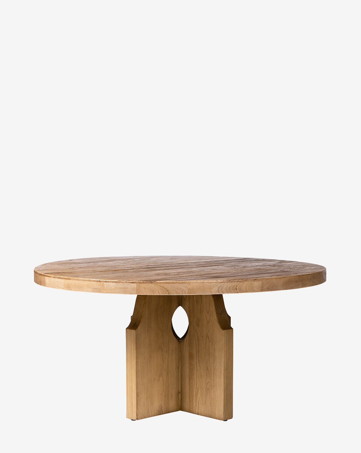 The Bayard Round Dining Table features a thick reclaimed elm wood top and a sturdy cross-shaped pedestal base with a small diamond cutout, all inspired by Swedish design and showcased against a plain white background by McGee & Co.