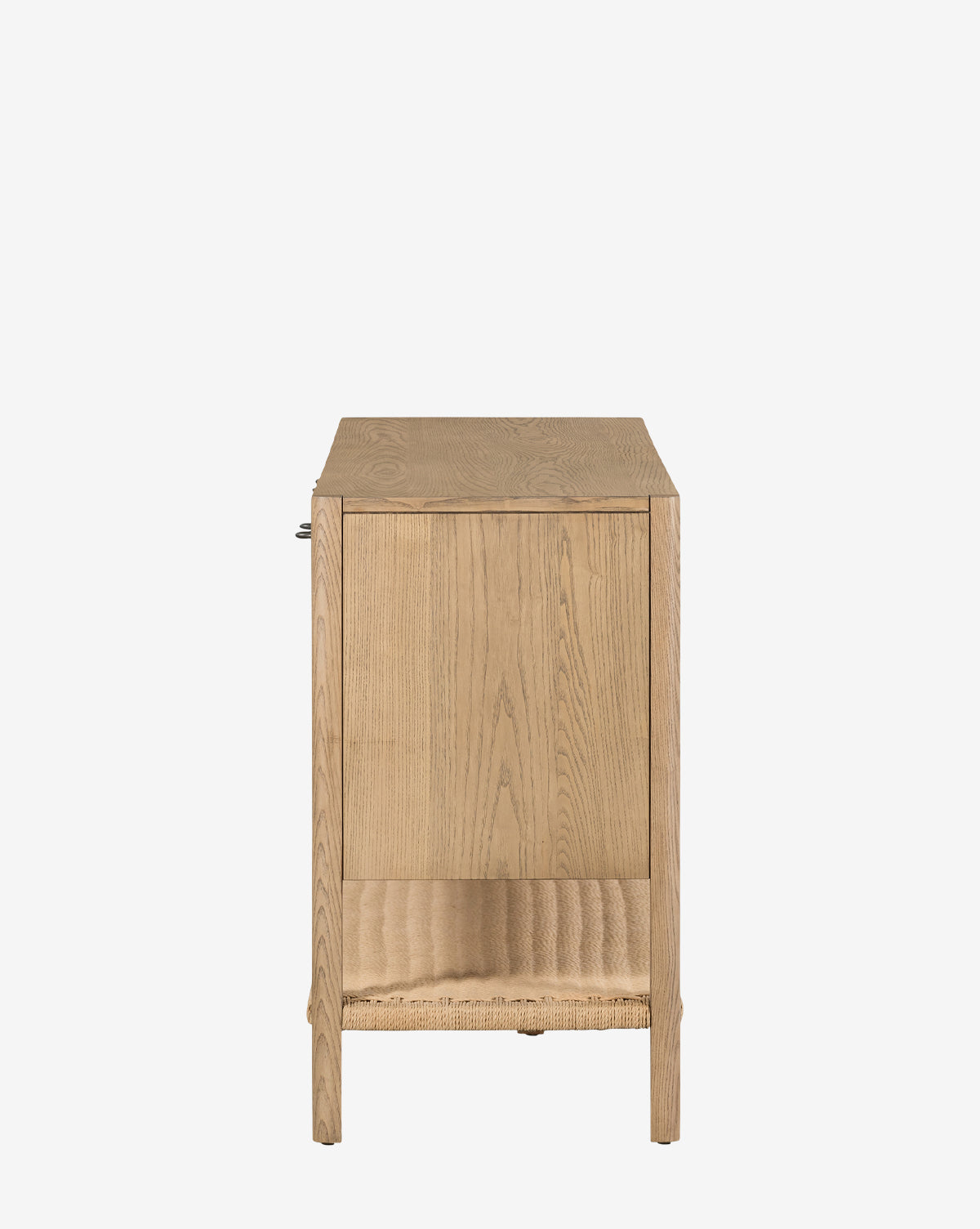 Side view of the Brio Sideboard, made from solid ash with Danish-inspired design, simple lines, a flat top, and a textured lower shelf. Shown against a plain white background, by Vendixs