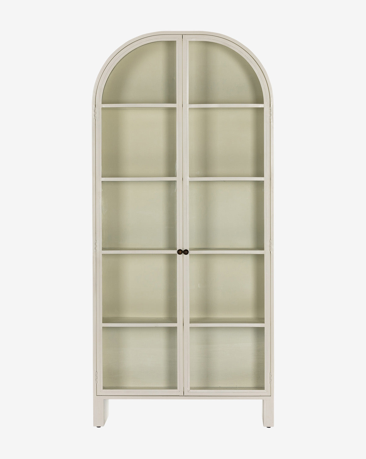 The Brookes Cabinet is tall and light-colored, featuring a rounded arch top, glass doors with two small round center handles, and four interior shelves for a refined look, by Vendixs