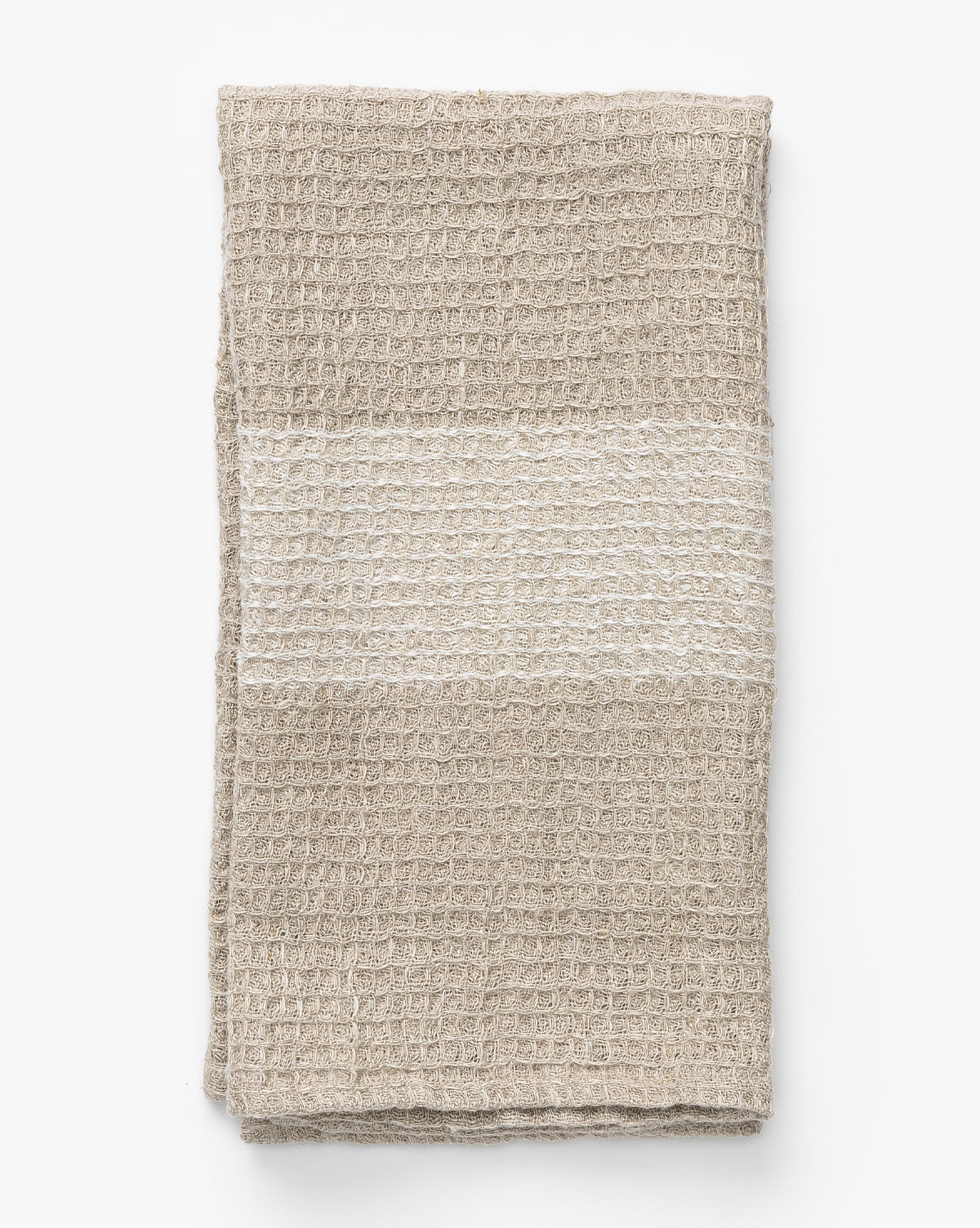 The Bunton Waffle Tea Towel, in beige linen with a lighter horizontal band and waffle weave texture, is neatly folded against a white background, by Vendixs