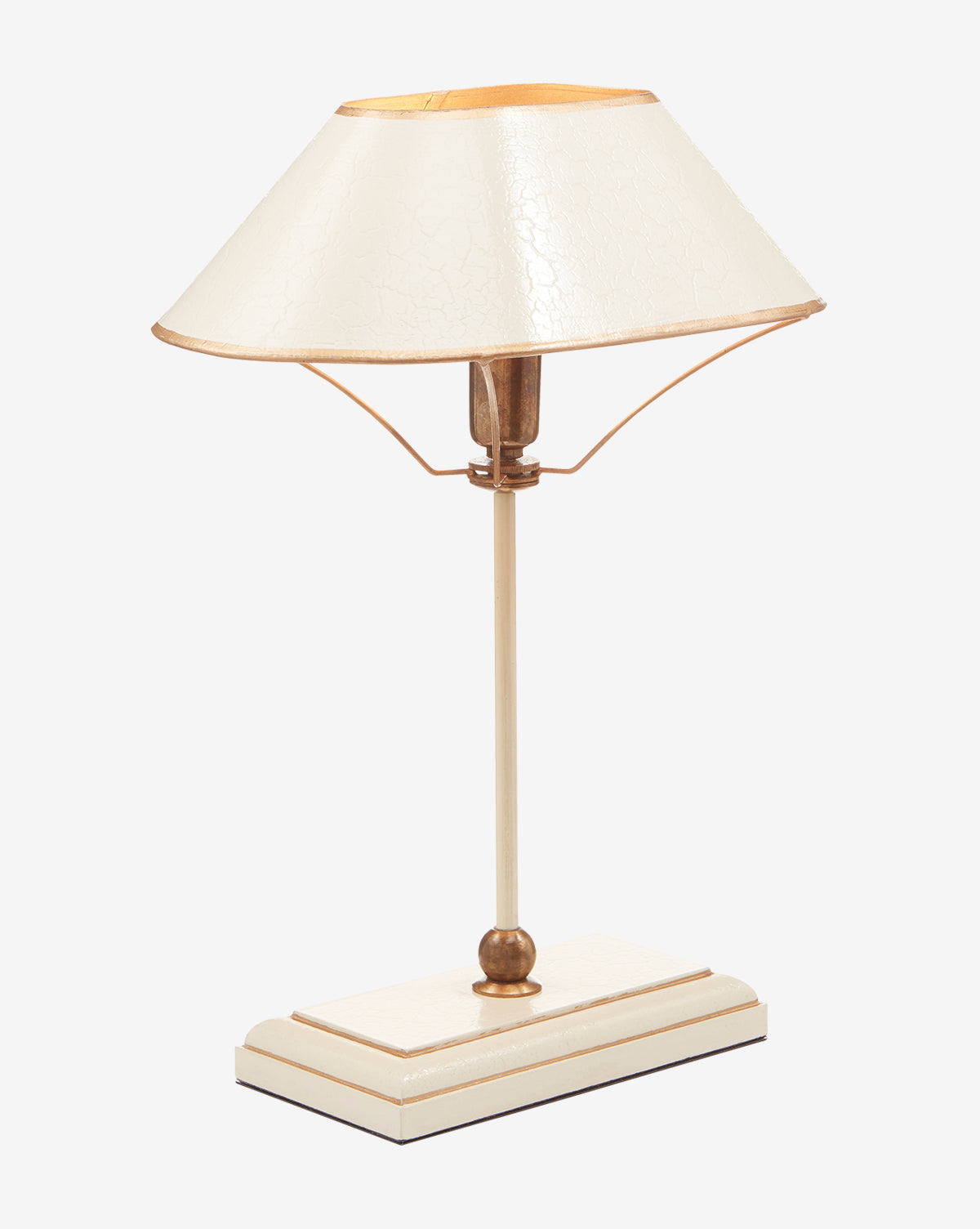 The Daphne Table Lamp features a cream shade, slim stand, and rectangular base with gold accents, creating a minimalist yet elegant design that elevates any space, by Vendixs