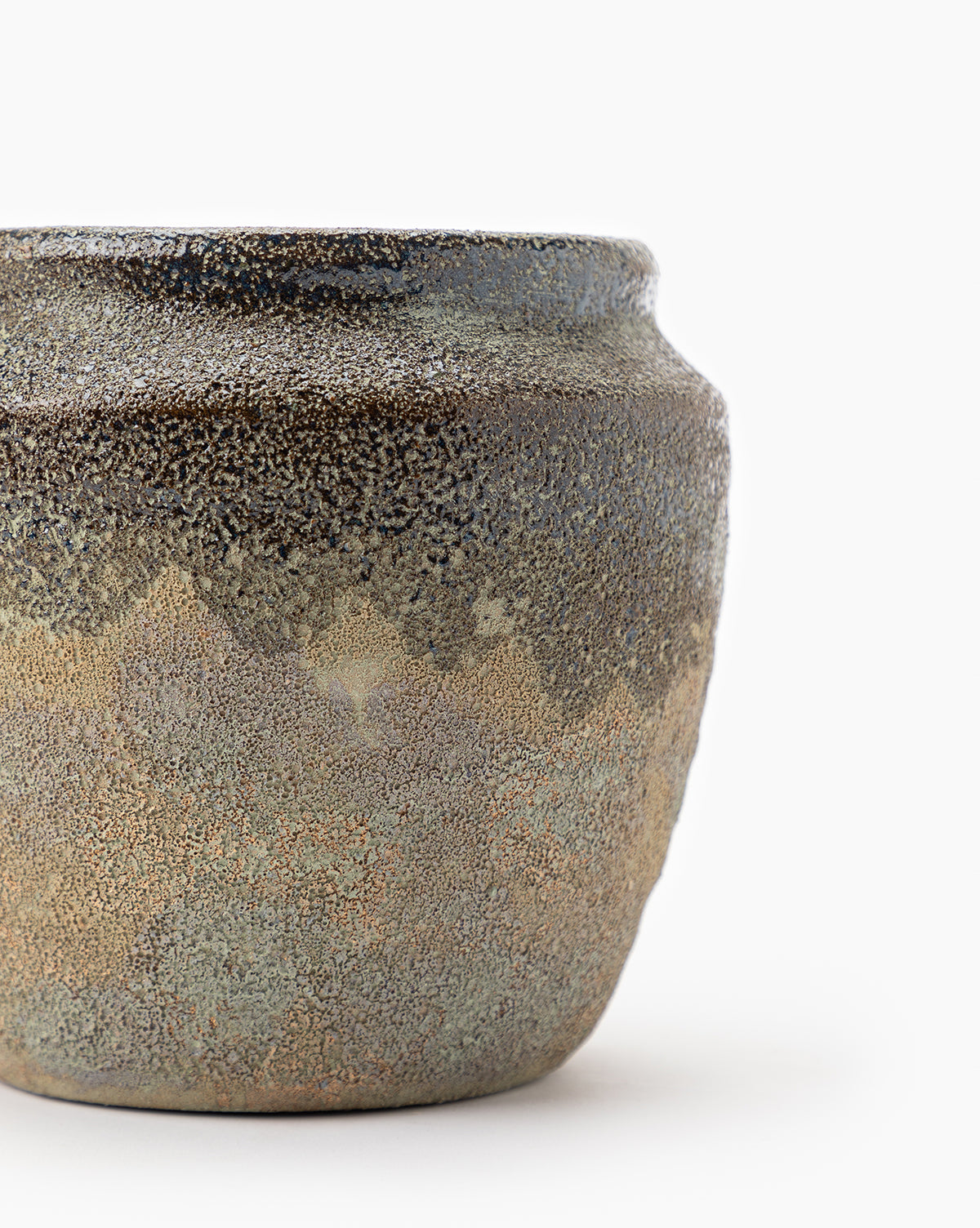 Close-up of Earthy Textured Pot highlighting its rich texture and matte glaze, from Vendixs