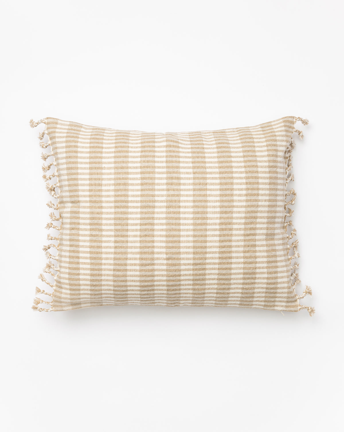 The Gwen Pillow Cover is a rectangular linen-cotton cover with beige and white horizontal stripes, small tassels on the short fringed edges, and a subtle woven texture, shown on a white background, by Vendixs