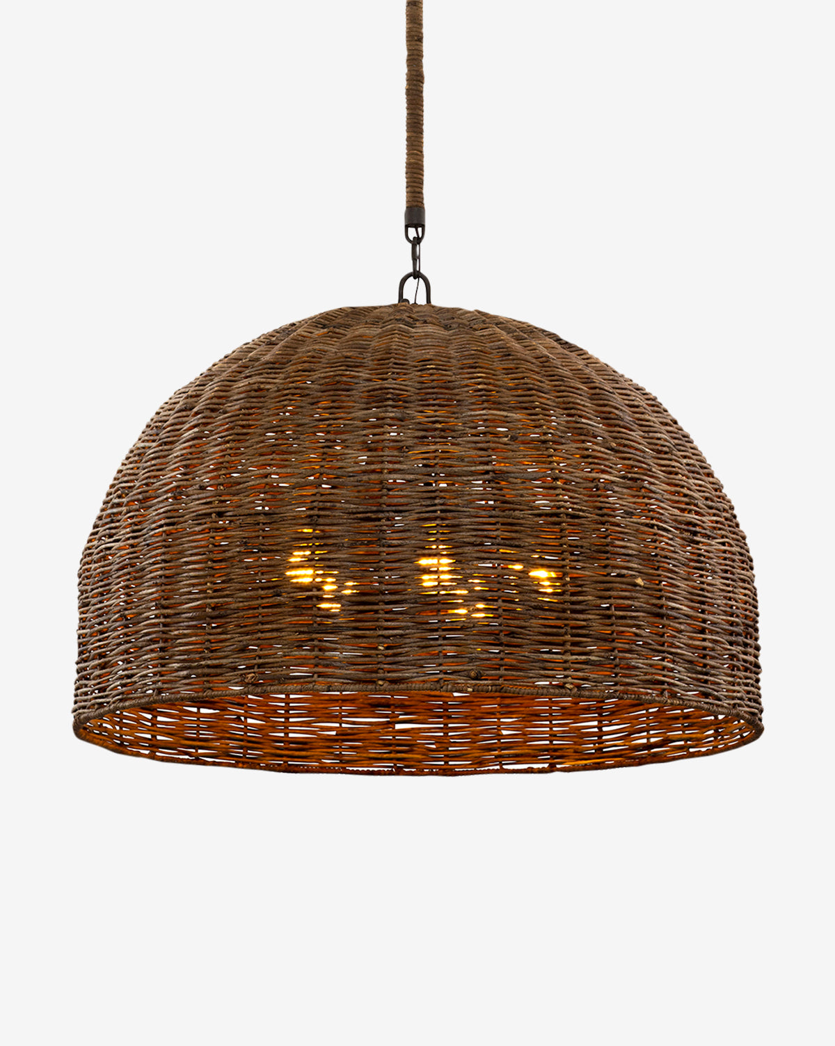 The Huxley Chandelier by Troy Lighting features a dome-shaped, woven rattan design that hangs from the ceiling, casting a warm glow through its natural brown wicker material. Vendixs