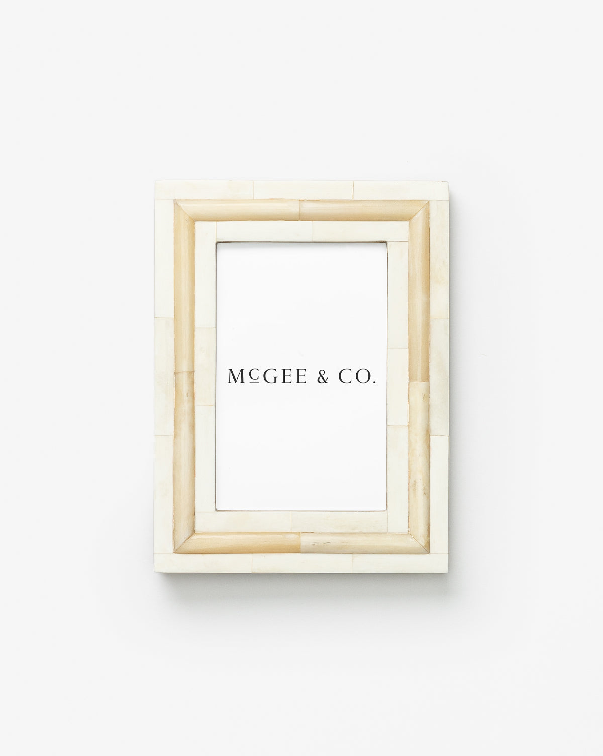An off-white, rectangular Inlay Bone Frame with a tiled bone trim, crafted from engineered wood, is shown vertically on a plain white background and contains a placeholder print labeled Vendixs in black text.