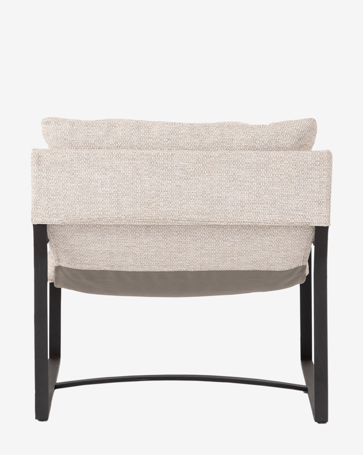 The Ismay Sling Chair is a modern iron chair with a black metal frame, curved legs, light beige upholstery, and a removable cushion. Shown from the back against a plain white background by McGee & Co.