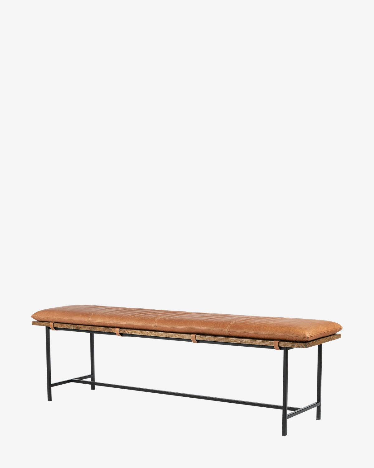 The Jagger Accent Bench features a minimalist design with a tan leather cushion and black metal legs, seamlessly blending into any space—ideal for transitional styles. Shown against a plain white background by Vendixs