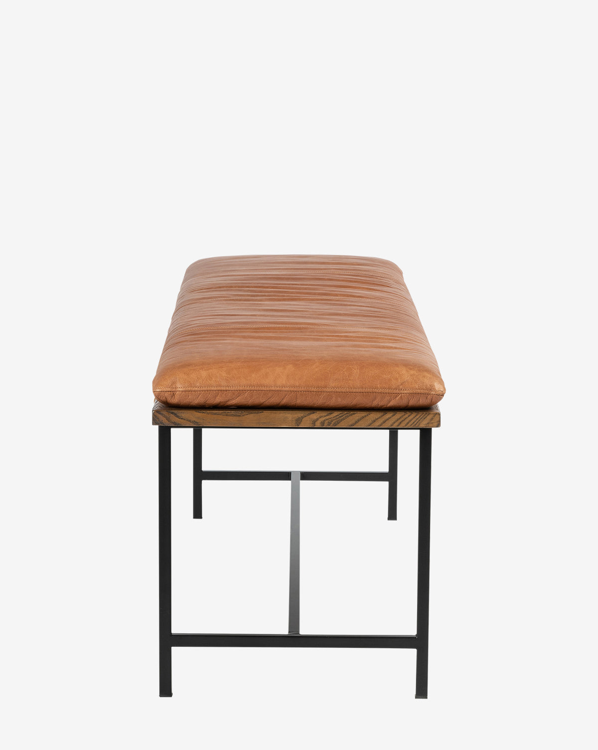 The Jagger Accent Bench features a brown leather cushioned seat and black metal legs, shown from the front against a white background—perfect for bringing transitional style to your space, by Vendixs