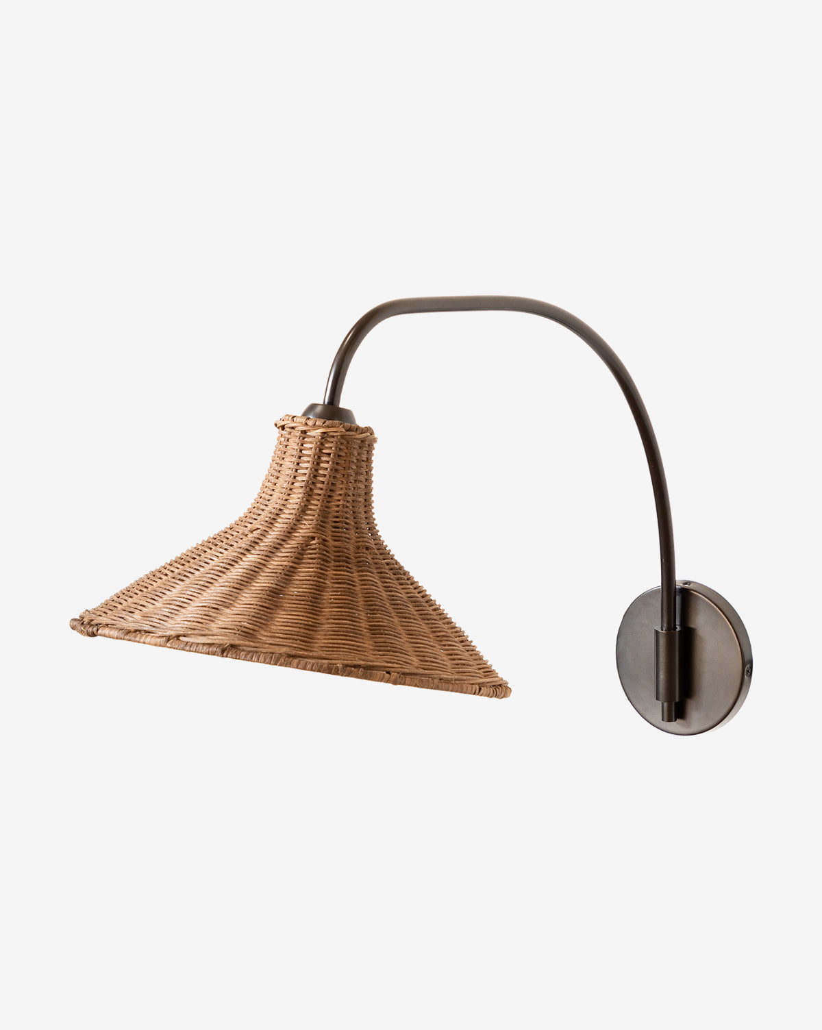 The Makerspalm Johanson Woven Sconce features a natural rattan conical shade and a curved antique bronze arm on a round wall plate, shown against a plain white background. Vendixs