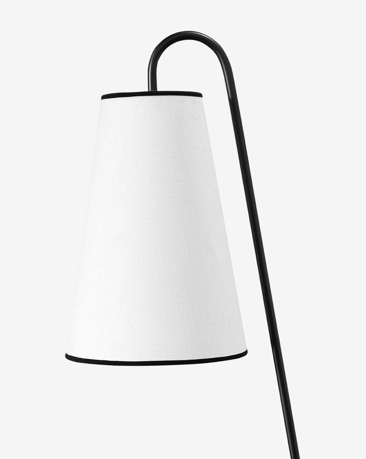 The Jonas Floor Lamp boasts a sleek black curved metal stand and a white linen shade, offering a modern design perfect for contemporary spaces, by Vendixs