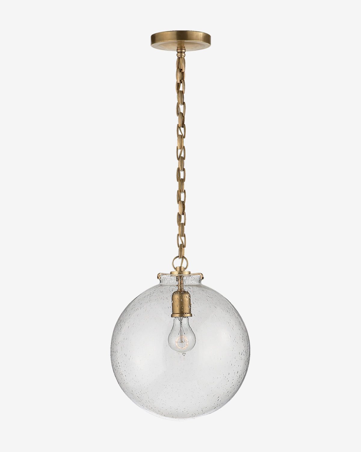 The Katie Globe Pendant by Visual Comfort & Co. Signature features a brass chain, round glass globe shade, and exposed bulb for a timeless look. Vendixs