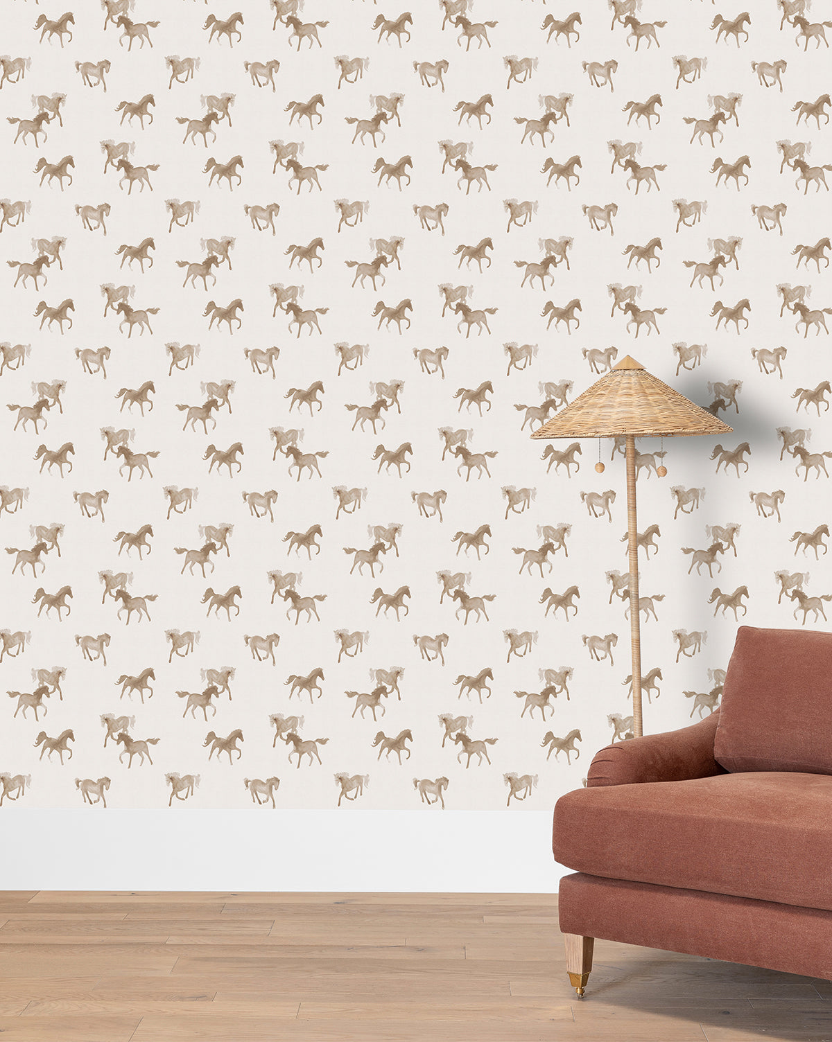 Galloping horses in a watercolor style bring movement and warmth in taupe and beige shades to this wallpaper by Vendixs