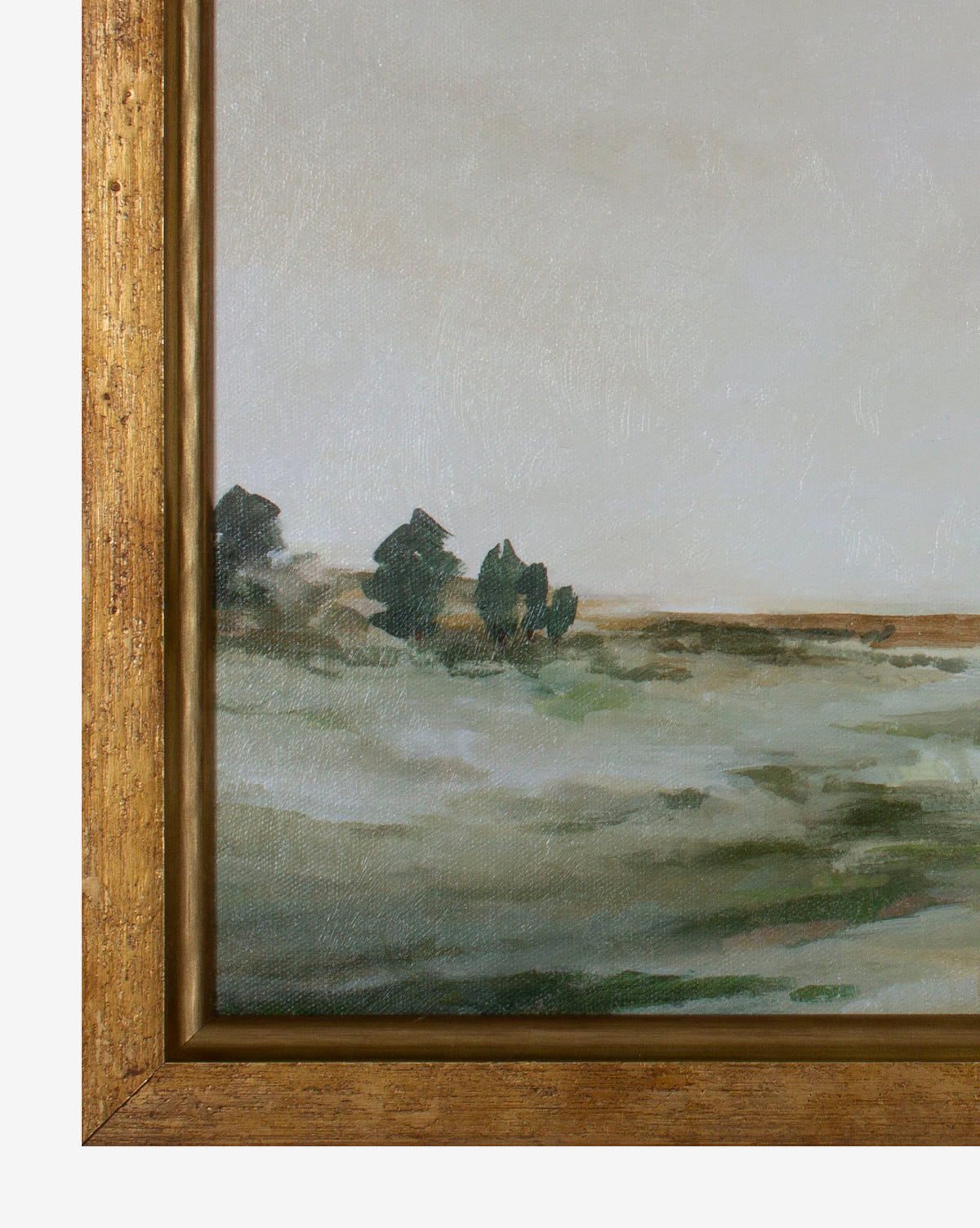 A close-up of Lush Landscape framed canvas art reveals green hills, distant trees, and a muted sky with soft, impressionistic brushstrokes. The piece features gallery-quality materials and a warm gold-finished wooden frame.