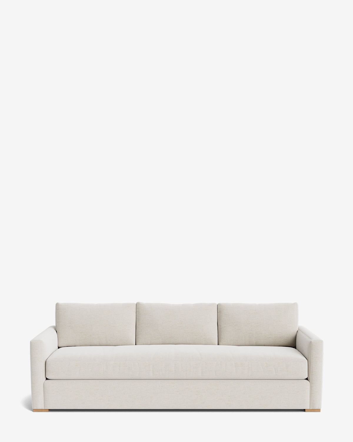 The Macy Upholstered Sofa (84-96) by Community is a modern, light beige three-seater with square arms and three back cushions, shown against a plain white background by Vendixs