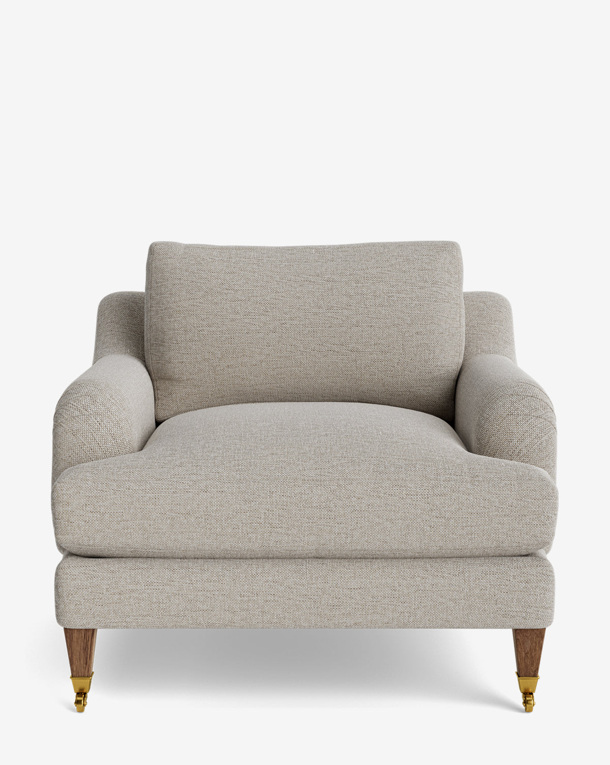 The Lucille English Roll Arm Lounge Chair features a wide, light beige design with plush down-wrapped cushions, wooden legs, and gold caster wheels, shown against a white background by McGee & Co.