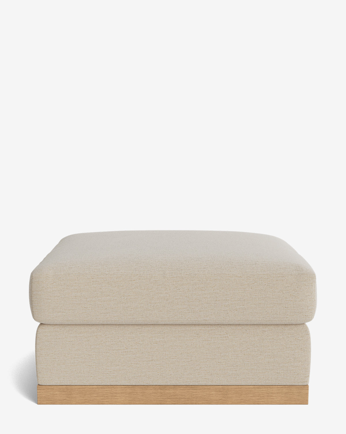 The Vernon Modular Ottoman by Community features a beige velvet cushion and a light wood base, shown against a plain white background. Vendixs