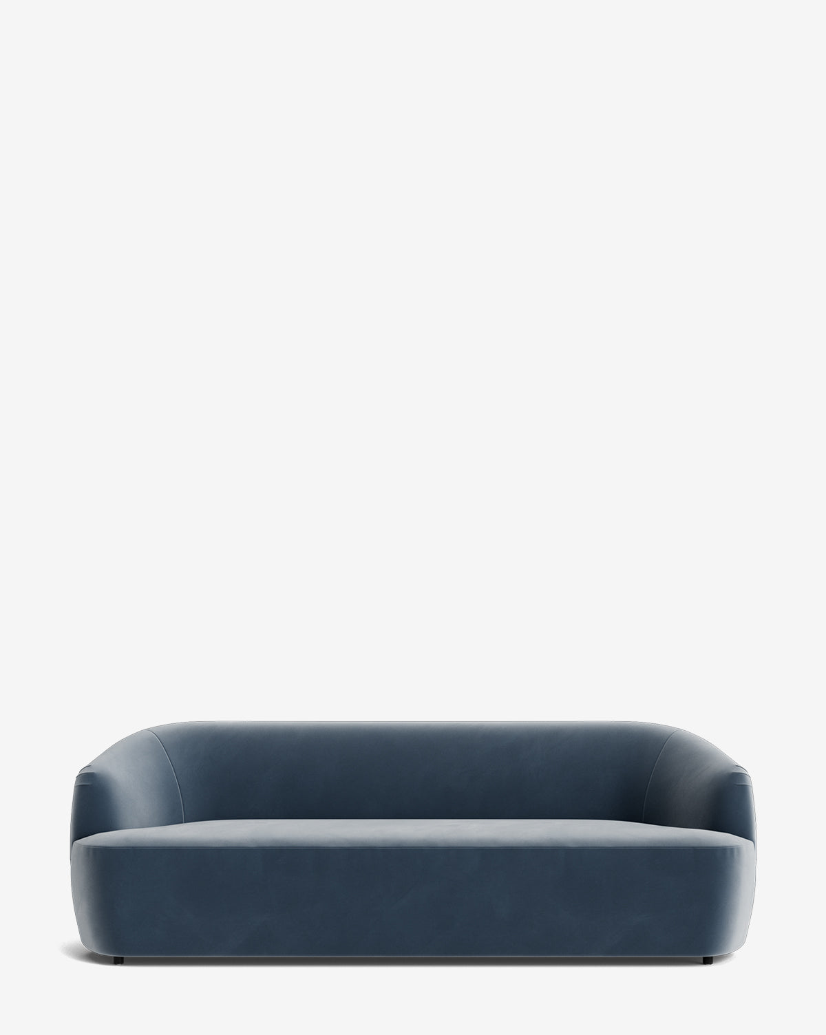 The Makerspalm Byron Sofa 96 features a modern, low-profile curved back, rounded edges, and a legless blue design—an ideal statement piece for contemporary spaces. Vendixs