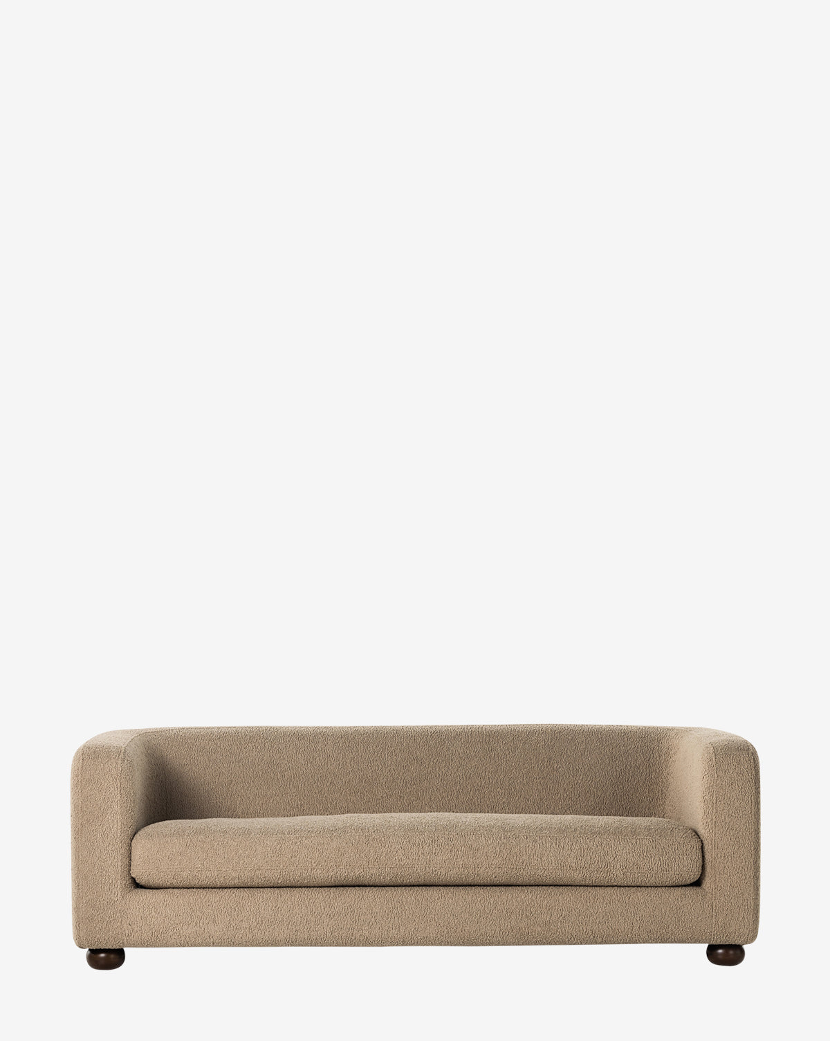 The Four Hands Quill Sofa 84 in beige features modern design with rounded arms and a plush seat cushion, shown against a plain white background. Vendixs
