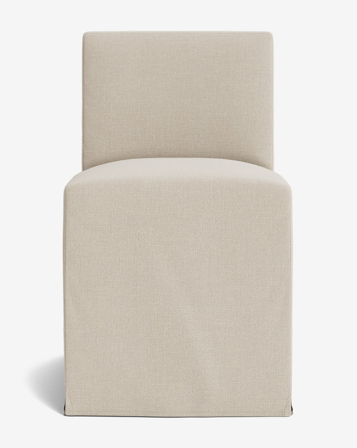 The Olivier Slipcover Dining Chair is a modern, armless chair with a beige fabric slipcover, straight back, boxy design, and feather-down cushion, shown against a plain white background by McGee & Co.