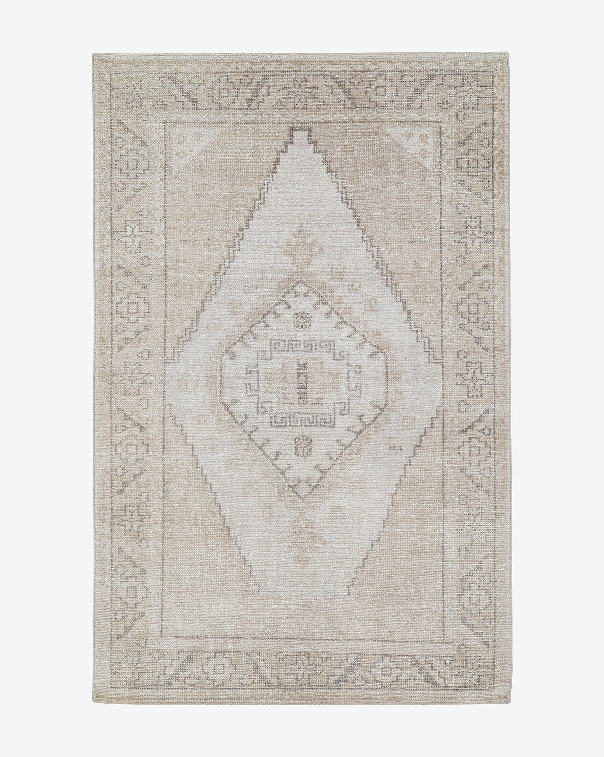 The Pembroke Hand-Knotted Wool Rug features a beige and cream vintage-inspired design with a faded geometric diamond center and subtle border, offering a timeless, distressed look ideal for any space, by Vendixs