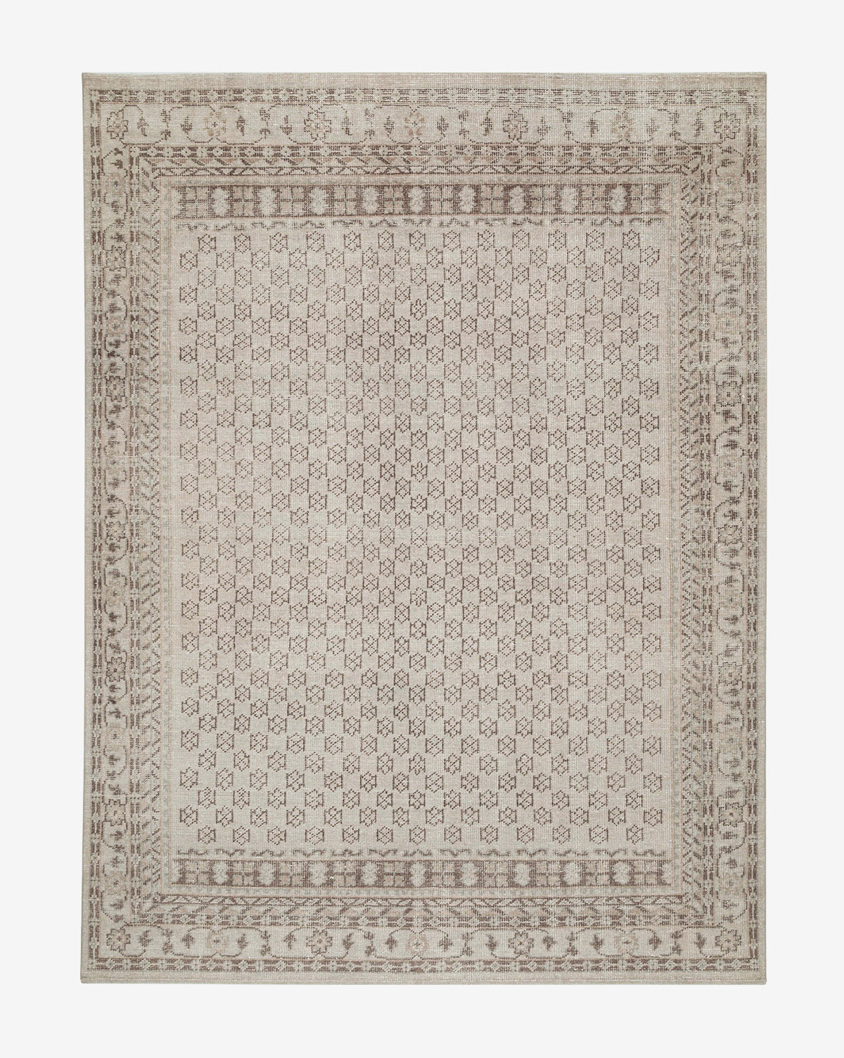 The Anya Neutral Hand-Knotted Wool Rug features an intricate geometric and floral pattern in beige and light brown with a detailed border, offering a timeless, neutral accent for any space, by Vendixs