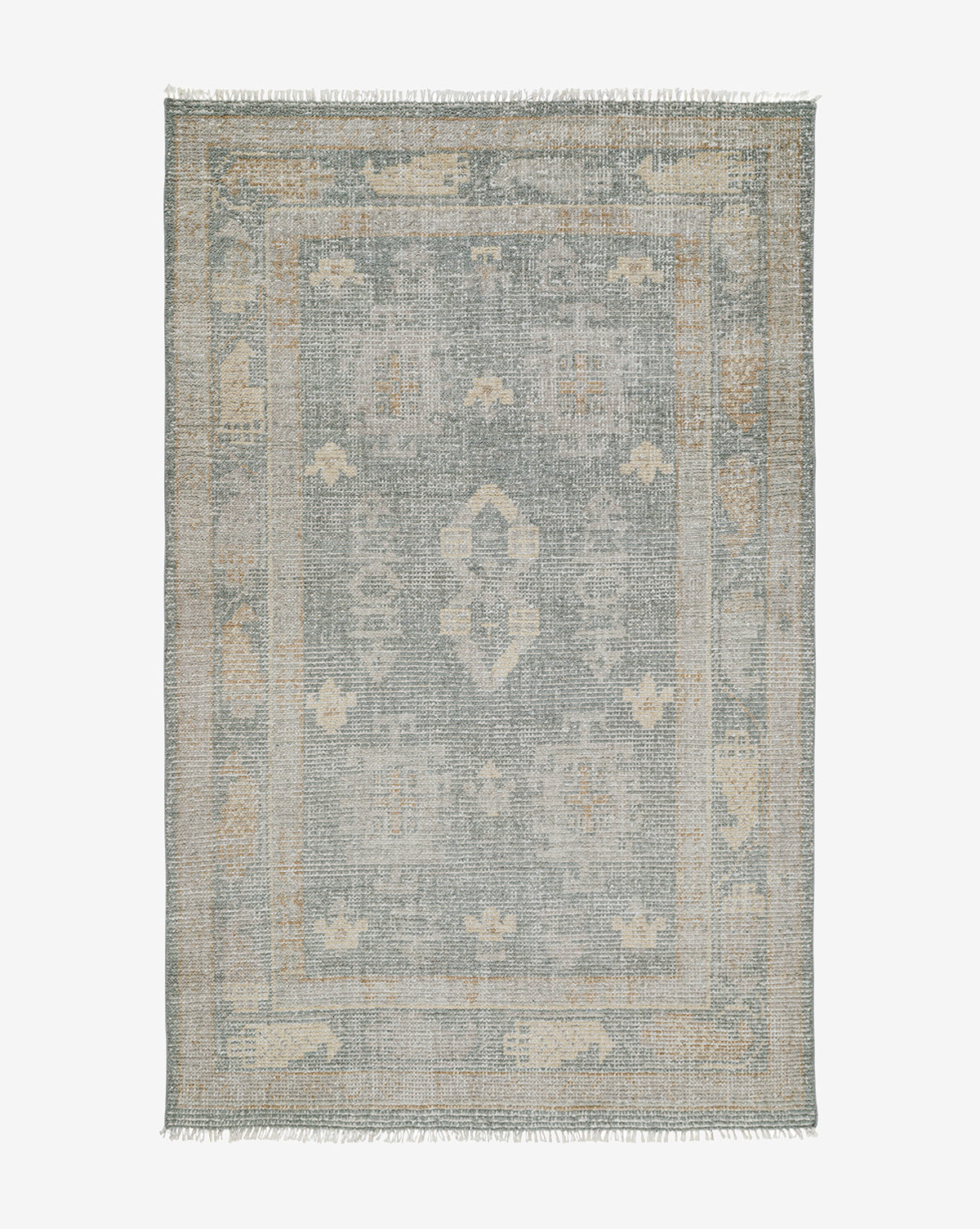 The Roslin Hand-Knotted Wool Rug features a faded, intricate pattern in muted gray, beige, and light blue tones, accented with a decorative border, geometric motifs, and short fringe along the rectangular edges, by Vendixs