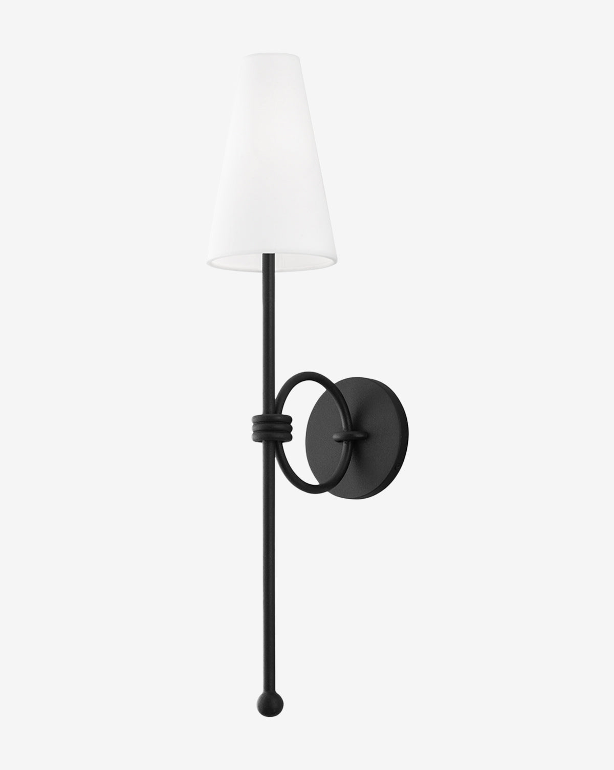 The Magnus Wall Sconce by Troy Lighting is a modern black metal fixture with a round base, slim vertical rod, and cone-shaped white linen shade, shown against a plain white background. Vendixs