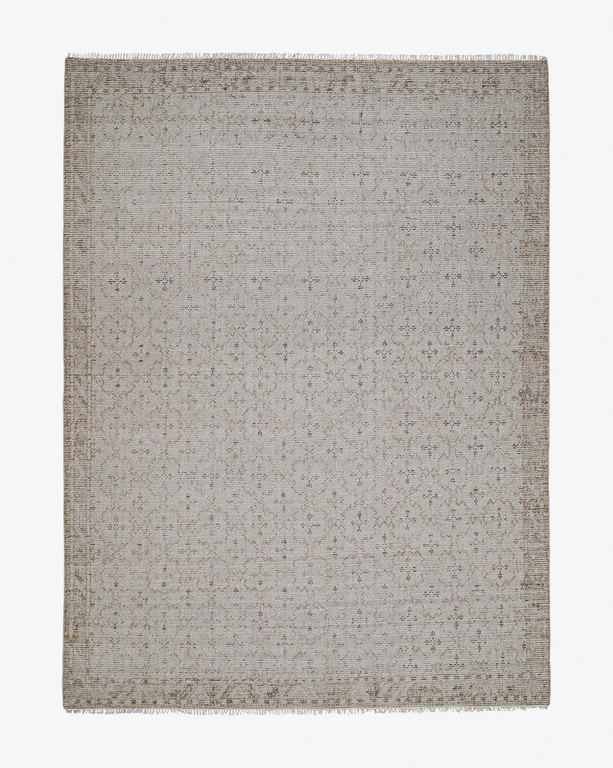 The Mali Hand-Knotted Rug is a square, light beige rug with subtle floral and geometric patterns and short fringe edges, offering a refined, neutral look with its delicate, evenly distributed design, by Vendixs