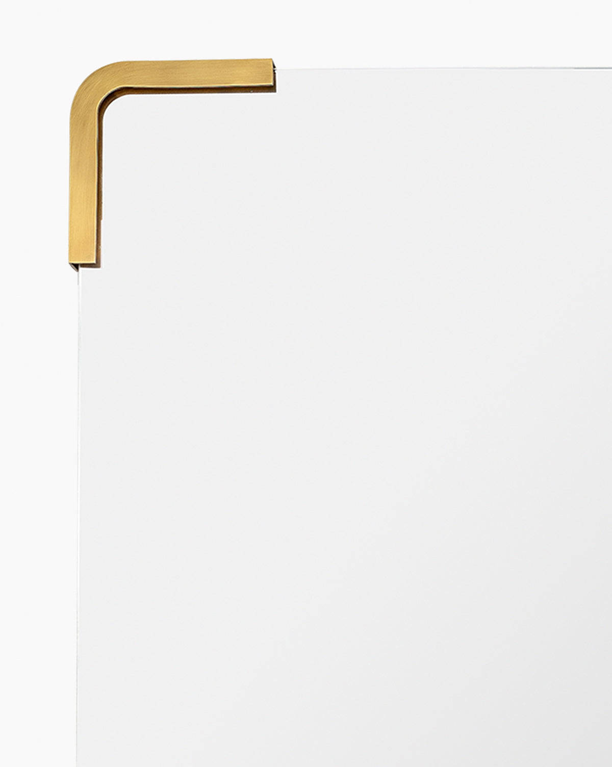 Close-up of the Mare Mirrors top left corner, featuring its frameless design with a gold metal bracket, highlighting its modern style against a plain white background, by Vendixs