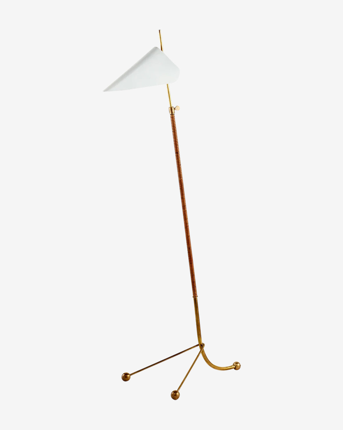 The Moresby Floor Lamp features a thin brass stand, a leather-wrapped middle section, a white triangular shade, and an elegant tripod base with three round brass feet for modern lighting style, by Vendixs