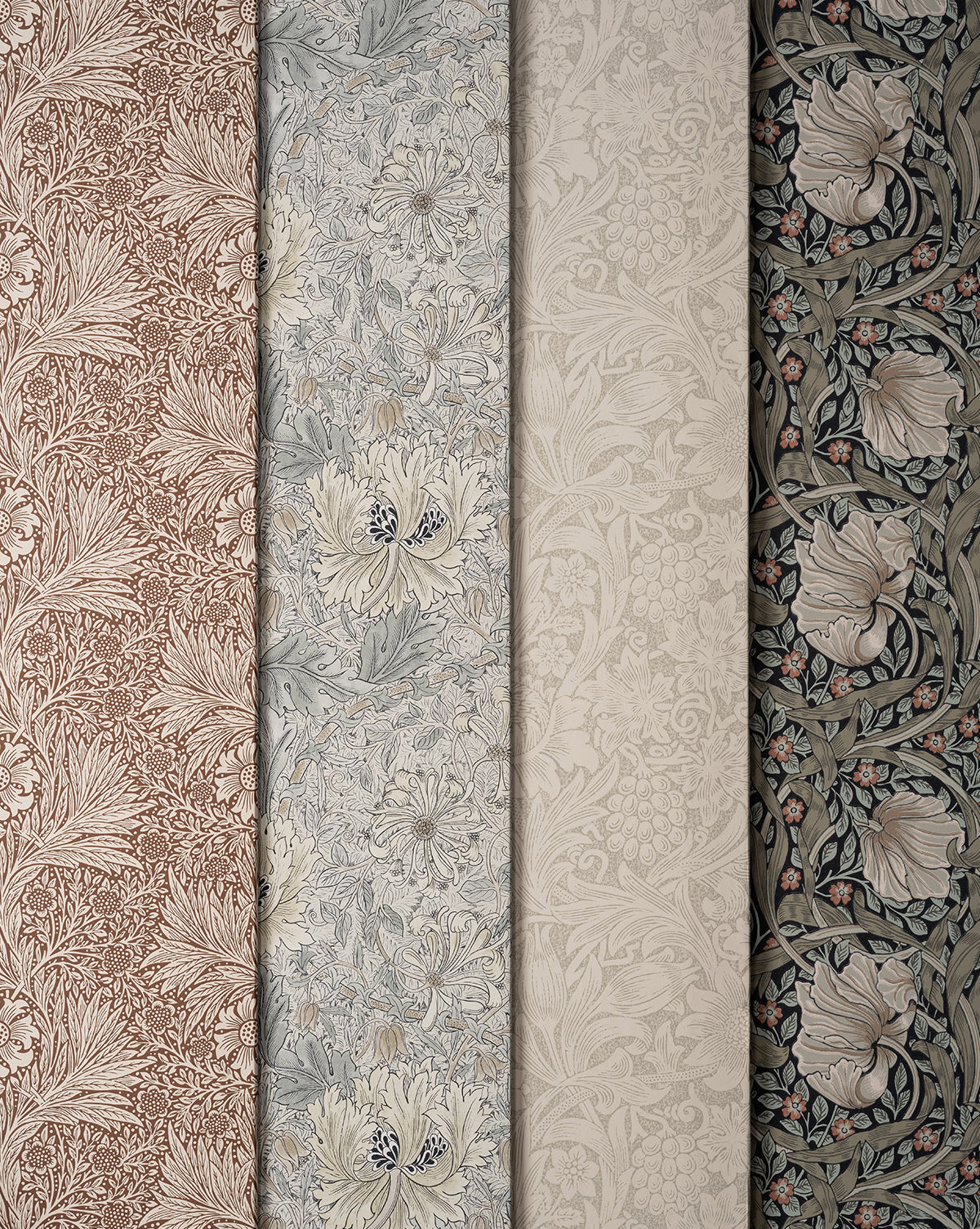 Four wallpaper rolls are shown side by side, each with intricate floral and botanical patterns, including the Morris & Co. x Vendixs Honeysuckle & Tulip Slate Blue Wallpaper by Sanderson Design Group, Inc., in varied color schemes—McGee & Co.