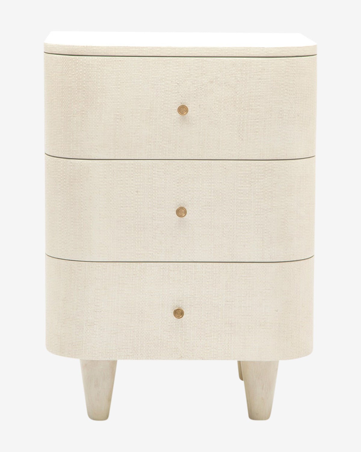 The Olinda Nightstand is a beige, three-drawer piece with rounded edges and brass pulls, supported by four short tapered legs—an elegant modern accent for bedrooms, shown here against a plain white background, by Vendixs