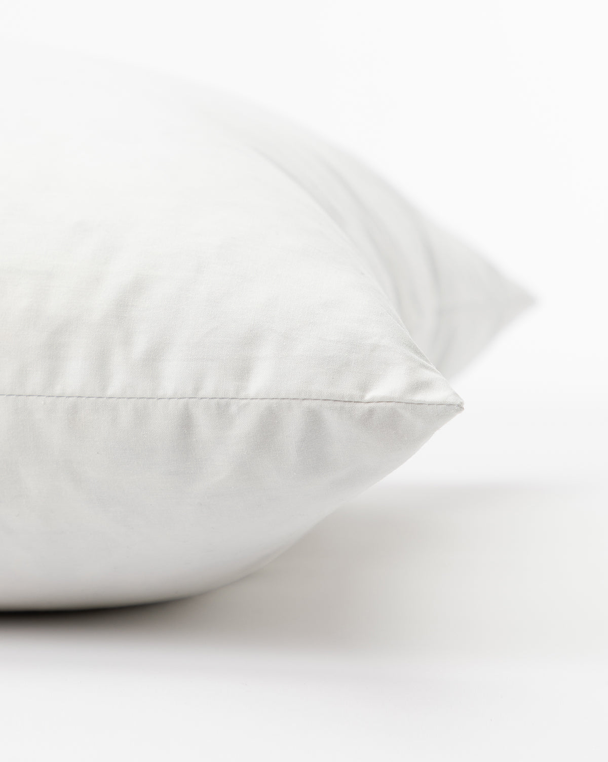 Down pillow insert detail with cotton covering from Vendixs
