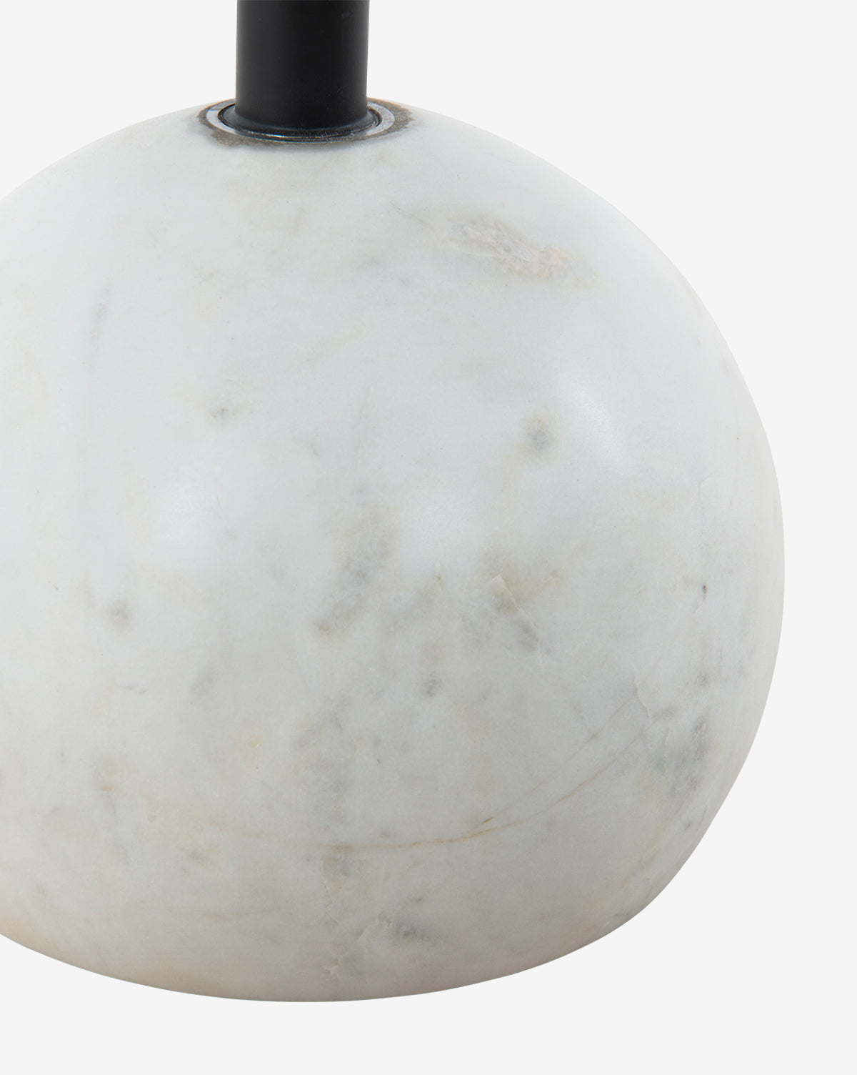 Close-up of the Raelynn Side Table’s round white marble base with subtle grey veining and a black cylindrical stem, shown against a plain white background, by Vendixs