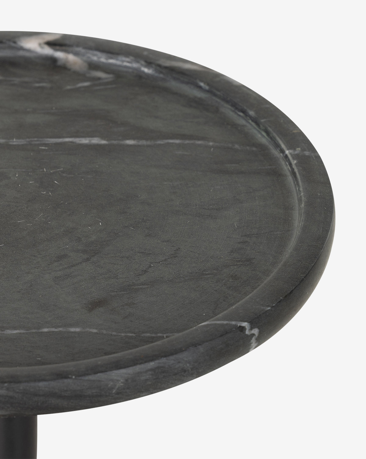 Close-up of the Raelynn Side Table showcasing its round, dark gray antique marble tabletop with subtle white veining and a slightly raised edge, set against a white background, by Vendixs