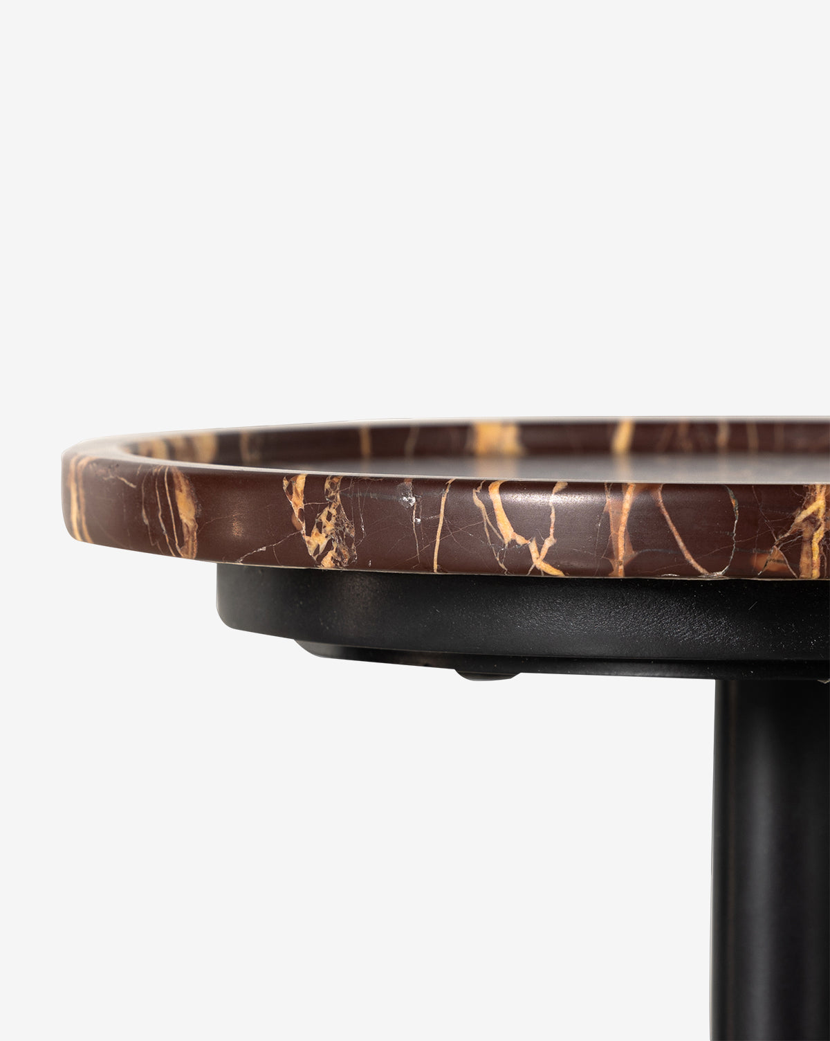 Close-up of the Raelynn Side Table, showcasing its round antique marble top with striking light brown and beige veining on a black base, set against a plain white background, by Vendixs