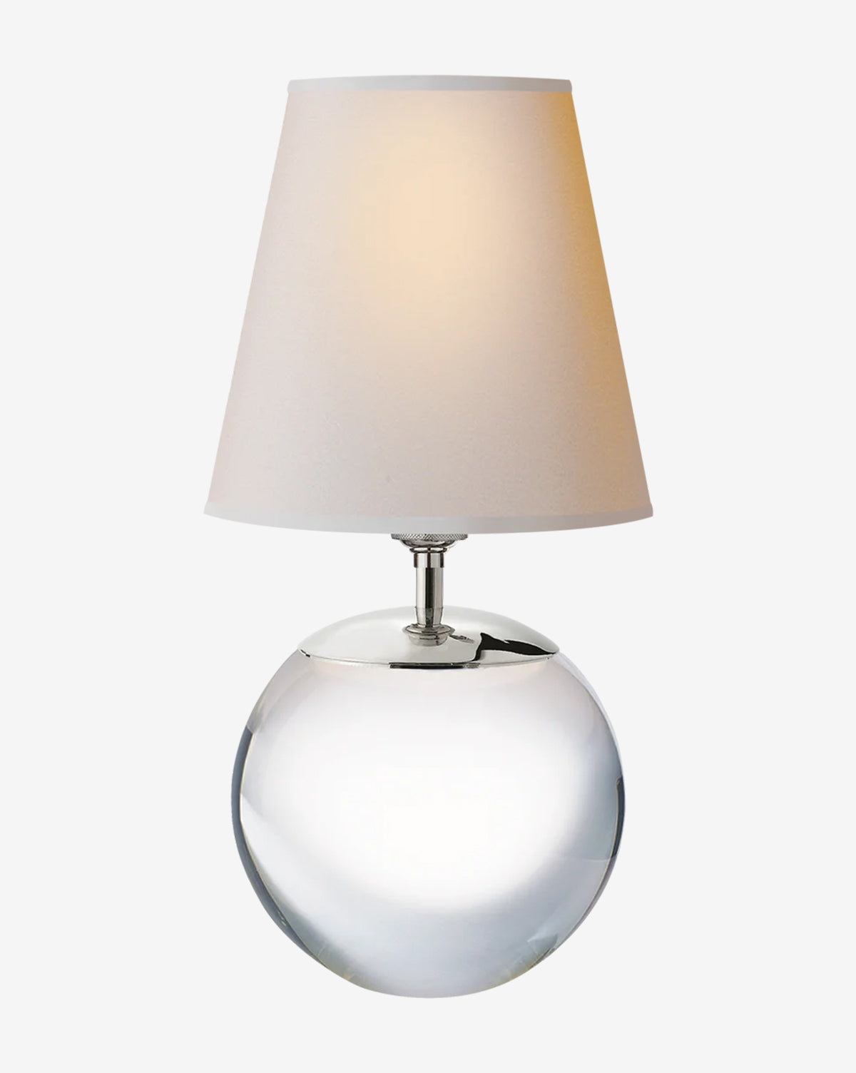 The Terri Round Table Lamp boasts a sleek, reflective silver base and a white fabric shade, offering soft ambient light—an ideal touch of elegance for any modern space, by McGee & Co.